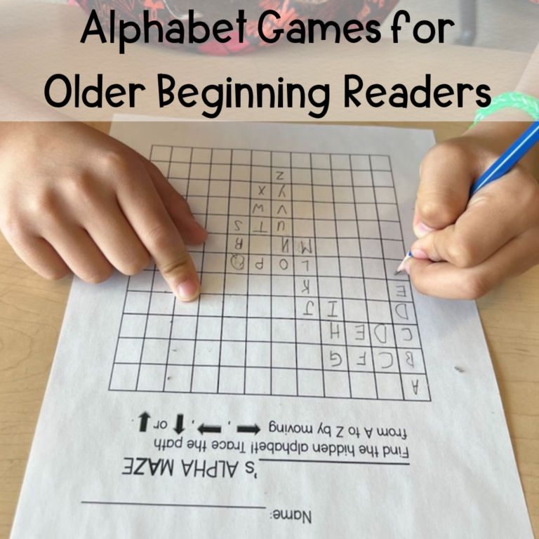 A young boy writes an alphabet maze on a sheet of paper.